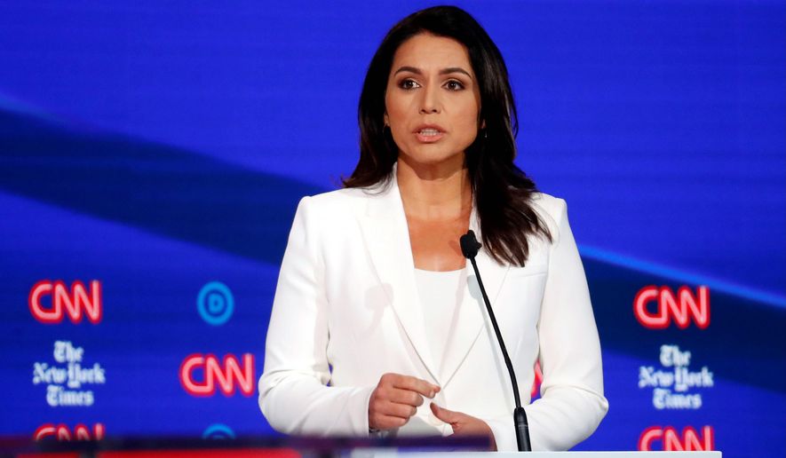 Democratic presidential candidate Rep. Tulsi Gabbard, D-Hawaii, speaks during a Democratic presidential primary debate hosted by CNN/New York Times at Otterbein University, Tuesday, Oct. 15, 2019, in Westerville, Ohio. (AP Photo/John Minchillo)