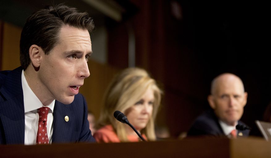 From left, Sen. Josh Hawley, R-Mo., accompanied by Sen. Marsha Blackburn, R-Tenn., and Sen. Rick Scott, R-Fla., questions U.S. Central Command Commander Gen. Joseph Votel as he testifies at a Senate Armed Services Committee hearing on Capitol Hill, Tuesday, Feb. 5, 2019, in Washington. (AP Photo/Andrew Harnik) **FILE**