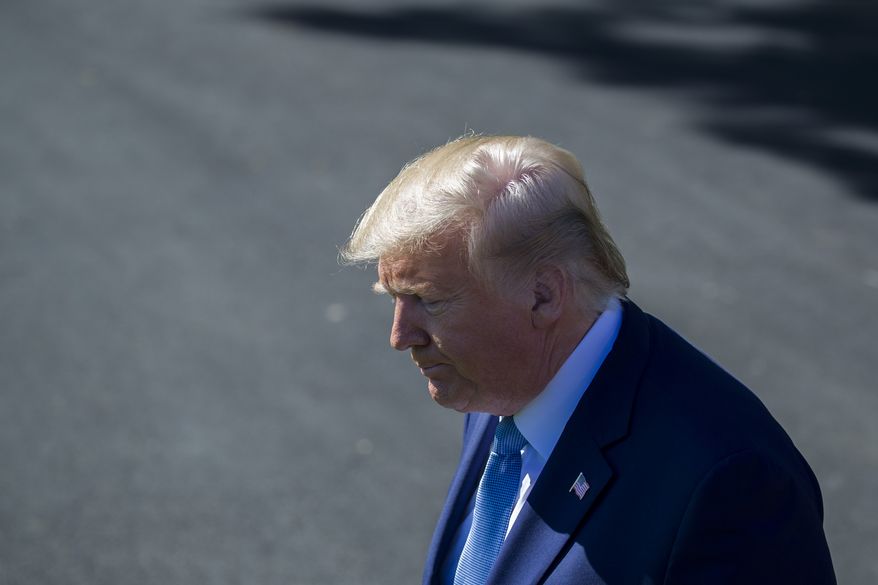 President Donald Trump turns to depart after speaking with reporters on the South Lawn of the White House before departing, Wednesday, Oct. 23, 2019, in Washington. (AP Photo/Alex Brandon)