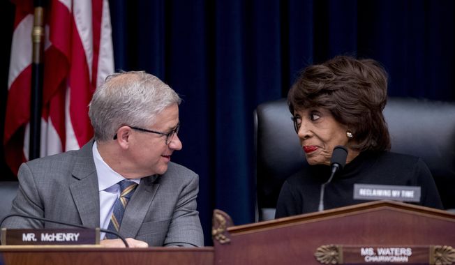Ranking Member Rep. Patrick McHenry, R-N.C., left, and Chairwoman Rep. Maxine Waters, D-Calif., speak together before Facebook CEO Mark Zuckerberg arrives for a House Financial Services Committee hearing on Capitol Hill in Washington, Wednesday, Oct. 23, 2019, on Facebook&#x27;s impact on the financial services and housing sectors. (AP Photo/Andrew Harnik)