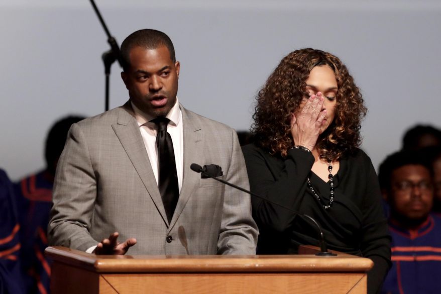 Maryland state Del. Nick Mosby and his wife, State's Attorney Marilyn Mosby, are shown in this file photo from a viewing service for the late U.S. Rep. Elijah Cummings held at Morgan State University, Wednesday, Oct. 23, 2019, in Baltimore. In a series of social-media postings on March 29, 2020, Mr. Mosby called for the release of racial demographic data pertaining to the current COVID-19 outbreak, saying doing so can help combat "health disparities in communities of color."(AP Photo/Julio Cortez) **FILE**
