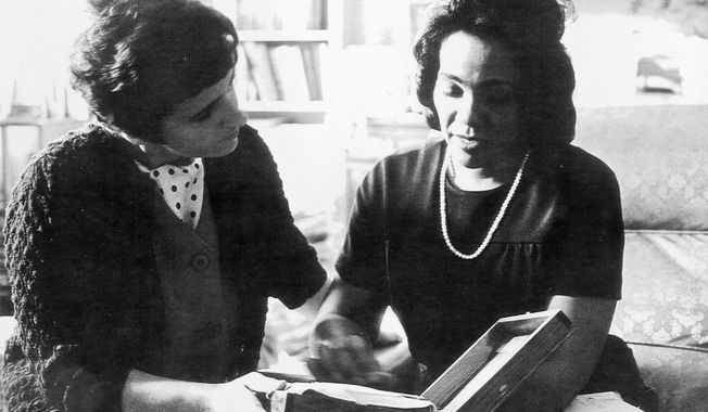 FILE - In this 1968 file photo, Coretta Scott King and Associated Press reporter Kathryn Johnson, left, review plans for The King Center during a meeting on the campus of Atlanta University in Atlanta.  Johnson, a trailblazing reporter for The Associated Press, died Wednesday, Oct. 23, 2019, at the age of 93, in Atlanta. Her intrepid coverage of the civil rights movement and other major stories led to a string of legendary scoops.  Johnson was the only journalist allowed inside Martin Luther King Jr.&#x27;s home the day he was assassinated.  (AP Photo, File)