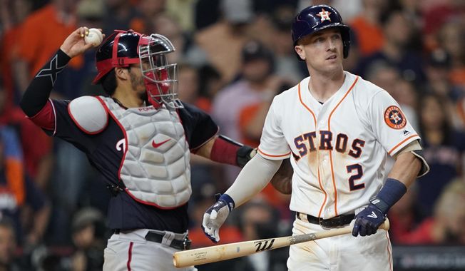 Houston Astros&#x27; Alex Bregman reacts after striking out during the ninth inning of Game 1 of the baseball World Series against the Washington Nationals Tuesday, Oct. 22, 2019, in Houston. (AP Photo/David J. Phillip)