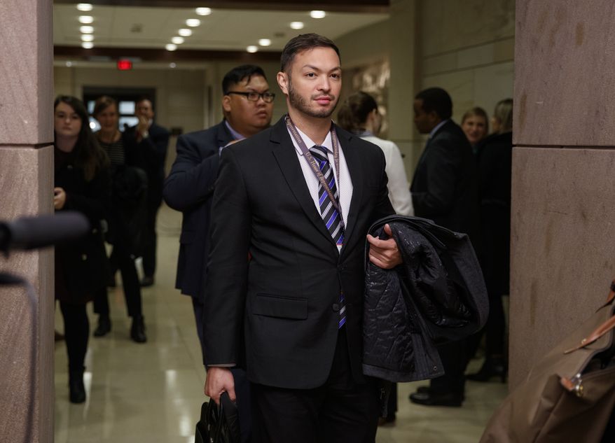 Rep.-elect Michael San Nicolas, D-Guam, walks from member-elect briefings on Capitol Hill in Washington, Thursday, Nov. 15, 2018. (AP Photo/Carolyn Kaster)