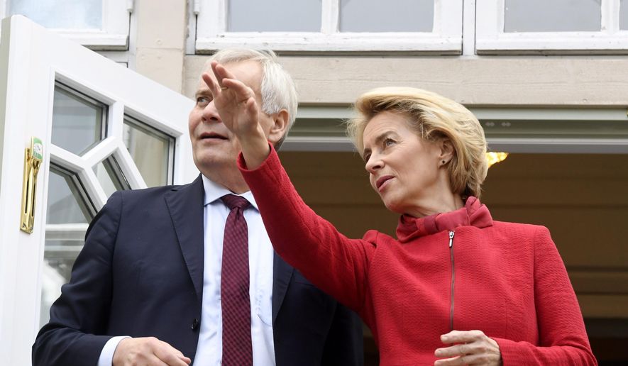 Prime Minister of Finland Antti Rinne, left, talks with President-elect of the European Commission Ursula von der Leyen at the Prime Minister's official residence in Helsinki, Finland, Thursday Oct. 24, 2019. (Heikki Saukkomaa/Lehtikuva via AP)