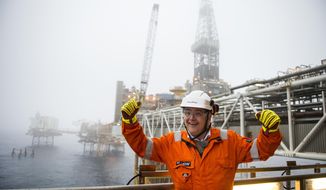 Norway&#39;s Minister of Petroleum and Energy Kjell-Borge Freiberg reacts during his visit to the Ekofisk field in the North Sea to mark the 50th anniversary of the discovery of the oil by the US oil company, Phillips Petroleum Company. (Carina Johansen / NTB Scanpix via AP)