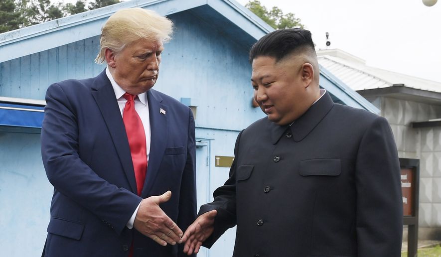 In this June 30, 2019, file photo, North Korean leader Kim Jong-un, right, and U.S. President Donald Trump prepare to shake hands at the border village of Panmunjom in the Demilitarized Zone, South Korea. North Korea said it&#39;s running out of patience with the United States over what it described as hostile policies and unilateral disarmament demands. It&#39;s warning that a close personal relationship between their leaders alone wouldn&#39;t be enough to prevent nuclear diplomacy from derailing. (AP Photo/Susan Walsh, File)
