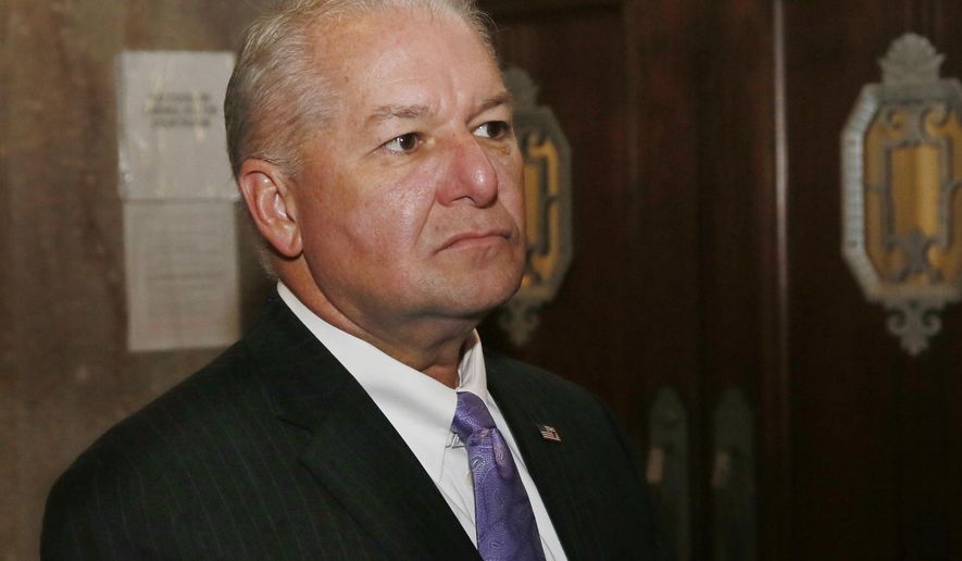 FILE - In this Aug. 10, 2016 file photo, David Prater, Oklahoma County District Attorney, talks to the media in Oklahoma City.   A former investigator for an Oklahoma prosecutor has accused his ex-boss of ordering an illegal investigation into supporters of criminal justice reform, then firing him when he failed to find any wrongdoing. The investigator, William Muller, has filed a "notice of claim" with the state and county against Oklahoma County District Attorney Prater, a first step toward a possible wrongful termination lawsuit.  (AP Photo/Sue Ogrocki, File)