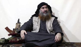 This file image made from video posted on a militant website April 29, 2019, purports to show the leader of the Islamic State group, Abu Bakr al-Baghdadi, being interviewed by his group&#39;s Al-Furqan media outlet. (Al-Furqan media via AP, File)