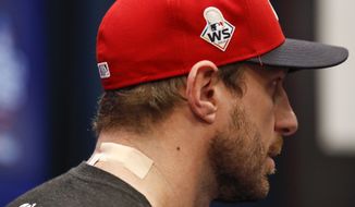 Washington Nationals starting pitcher Max Scherzer speaks during a news conference before Game 5 of the baseball World Series against the Houston Astros Sunday, Oct. 27, 2019, in Washington. Scherzer was slated to start Sunday&#39;s World Series game, has been scratched with spasms in his neck and right trapezius. (AP Photo/Alex Brandon) ** FILE **
