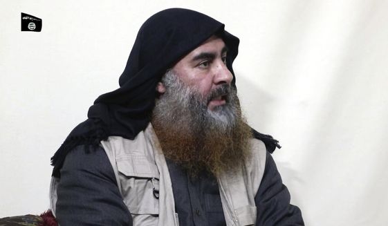 This file image made from video posted on a militant website April 29, 2019, purports to show the leader of the Islamic State group, Abu Bakr al-Baghdadi, being interviewed by his group&#39;s Al-Furqan media outlet. (Al-Furqan media via AP, File)