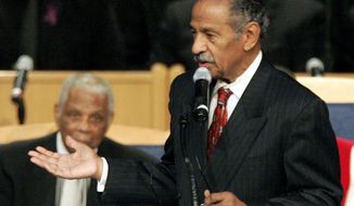 FILE - In a Nov. 2, 2005 file photo, Congressman John Conyers, D-Mich., speaks at the funeral for civil rights pioneer Rosa Parks in Detroit. Detroit police say the former congressman died at his home on Sunday, Oct. 27, 2019. He was 90. ( (AP Photo/Carlos Osorio, File)