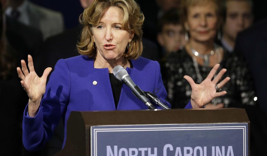 FILE - In this Nov. 4, 2014 file photo, Sen. Kay Hagan, D-N.C., gives her concession speech during an election night rally in Greensboro, N.C. Hagan. Family of former U.S. Sen. Kay Hagan issued a statement Monday, Oct. 28, 2019 that said Hagan died unexpectedly Monday morning. She was 66.(AP Photo/Gerry Broome, File)