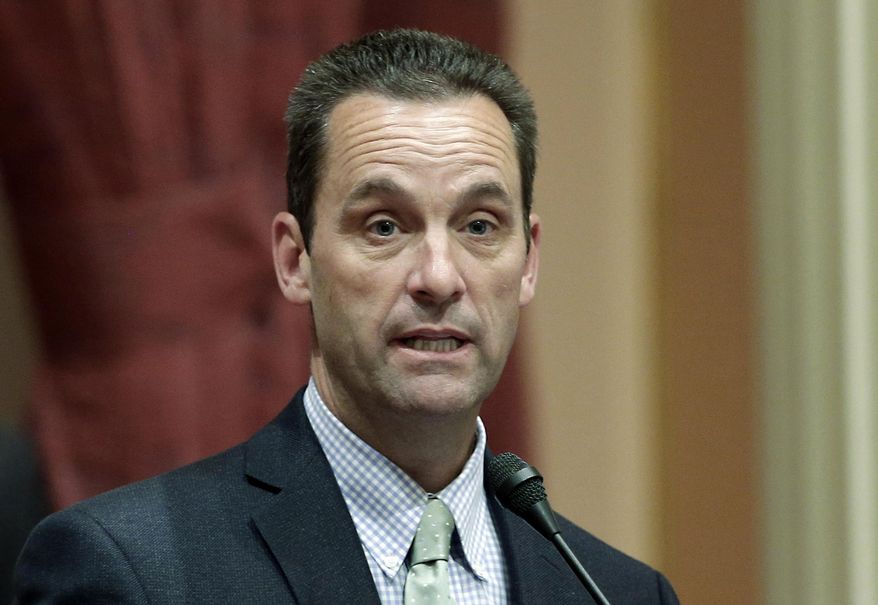 FILE - In this May 28, 2014, file photo, California state Sen. Steve Knight, R-Palmdale, speaks at the Capitol in Sacramento, Calif. Knight, a former Republican congressman may try to win back his old seat after Rep. Katie Hill, the Democrat who beat him in 2018 announced plans to resign amid an ethics investigation. Knight would face at least two other Republicans and a Democratic state Assemblywoman who has already locked up key endorsements. (AP Photo/Rich Pedroncelli, File)