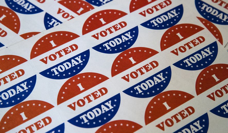 In this May 21, 2019, file photo, "I Voted Today" stickers are displayed at a polling place in Philadelphia. (AP Photo/Matt Rourke, File)