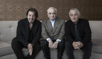 This Sept. 30, 2019 photo shows actor Al Pacino, from left, director Martin Scorsese, and actor Robert De Niro posing for a portrait to promote their upcoming film &amp;quot;The Irishman&amp;quot; in New York. (Photo by Victoria Will/Invision/AP)