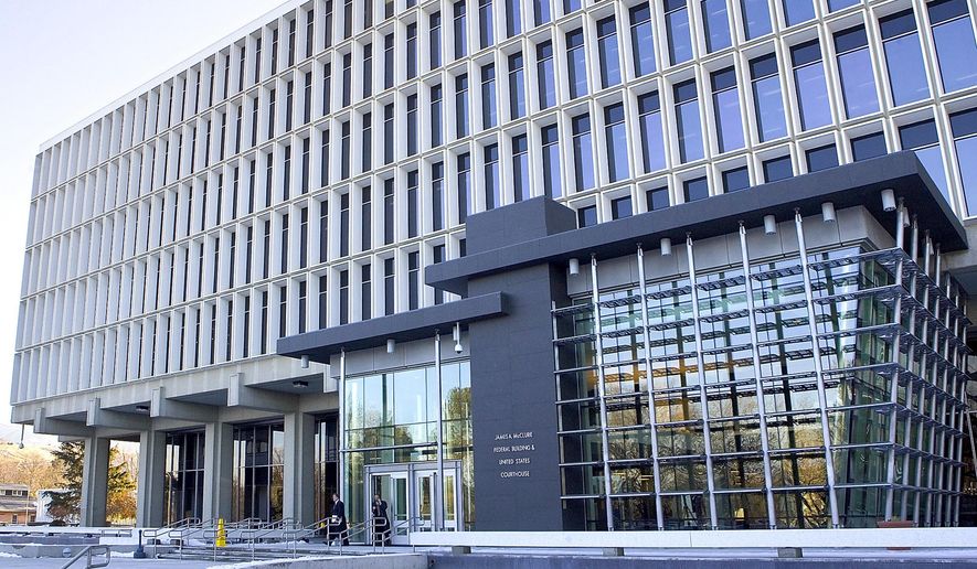 FILE - This Jan. 19, 2007 file photo shows the James A. McClure Federal Building & United States Courthouse in downtown Boise, Idaho. A federal lawsuit challenging Idaho's ballot initiative process as unconstitutional because it requires signatures from multiple legislative districts has been dismissed. Chief U.S. District Court Judge David C. Nye ruled Tuesday, Oct. 29, 2019, that Ryan Isbelle lacked standing to bring the lawsuit but didn't rule on the merits of the case. (AP Photo/Troy Maben, File)