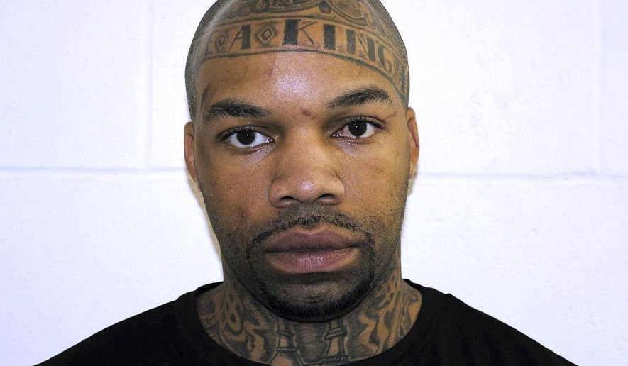FILE - This undatd booking photo released by the Pelham Police Department shows Dale Holloway. The family of a bishop who was shot in the chest while presiding at a church wedding in New Hampshire wedding says he’s still recovering from multiple gunshot wounds and remains in critical condition. Holloway, of Manchester, faces charges of attempted murder and assault stemming from the shooting, which also injured bride Claire McMullen. He’s pleaded not guilty. (Pelham Police Department via AP, File)