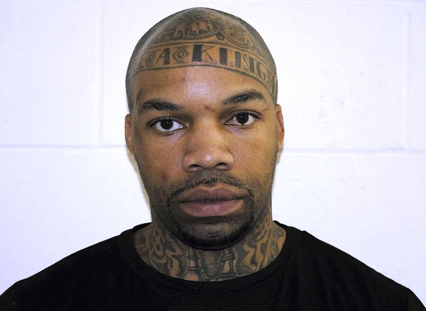 FILE - This undatd booking photo released by the Pelham Police Department shows Dale Holloway. The family of a bishop who was shot in the chest while presiding at a church wedding in New Hampshire wedding says he’s still recovering from multiple gunshot wounds and remains in critical condition. Holloway, of Manchester, faces charges of attempted murder and assault stemming from the shooting, which also injured bride Claire McMullen. He’s pleaded not guilty. (Pelham Police Department via AP, File)