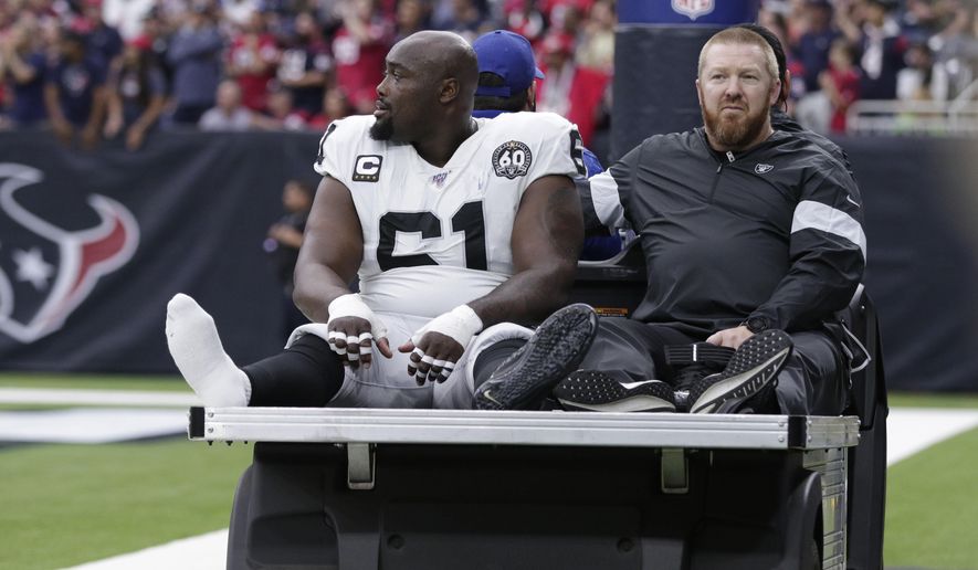 FILE - In this Oct. 27, 2019, file photo, Oakland Raiders center Rodney Hudson (61) leaves the team&#x27;s NFL football game against the Houston Texans after an injury during the first half in Houston. The Raiders are preparing to make do without the anchor of their offensive line. Hudson missed practice on Wednesday with a sprained ankle that knocked him out of last week&#x27;s loss at Houston and appears unlikely to be able to play this week against the Detroit Lions. Hudson is one of the most valuable members of the offense for the Raiders because of his strong blocking in the pass and run games and the ability to get the entire offense into the correct protections. (AP Photo/Michael Wyke, File)