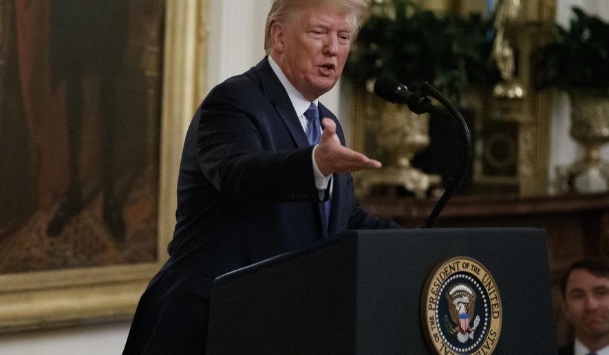 President Donald Trump speaks during a Medal of Honor Ceremony for U.S. Army Master Sgt. Matthew Williams, currently assigned to the 3rd Special Forces Group, in the East Room of the White House, Wednesday, Oct. 30, 2019, in Washington. (AP Photo/Alex Brandon)