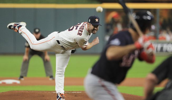 Houston Astros starting pitcher Justin Verlander throws against the Washington Nationals during the first inning of Game 6 of the baseball World Series Tuesday, Oct. 29, 2019, in Houston. (AP Photo/Mike Ehrmann, Pool)