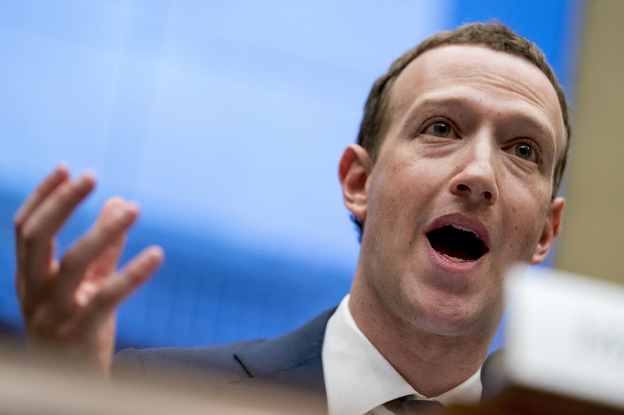 In this April 11, 2018, file photo Facebook CEO Mark Zuckerberg testifies before a House Energy and Commerce hearing on Capitol Hill in Washington. (AP Photo/Andrew Harnik, File)