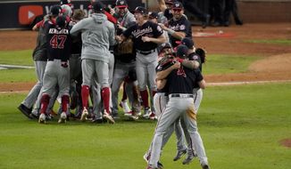 Washington Nationals celebrate after Game 7 of the baseball World Series against the Houston Astros Wednesday, Oct. 30, 2019, in Houston. The Nationals won 6-2 to win the series. (AP Photo/Eric Gay)