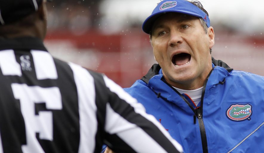Florida's head coach Dan Mullen argues a call during the game against South Carolina in the first half of an NCAA college football game Saturday, Oct. 19, 2019, in Columbia, SC. (AP Photo/Mic Smith)