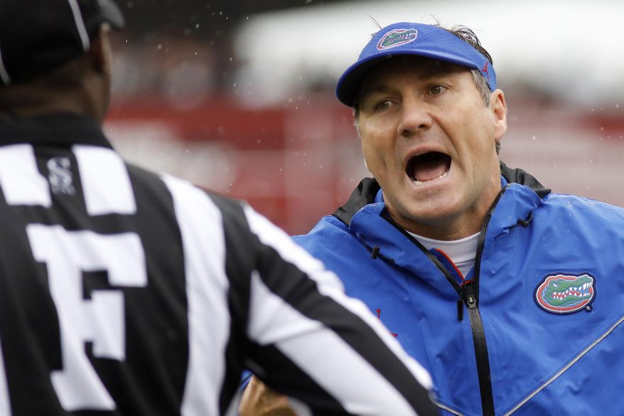 Florida's head coach Dan Mullen argues a call during the game against South Carolina in the first half of an NCAA college football game Saturday, Oct. 19, 2019, in Columbia, SC. (AP Photo/Mic Smith)