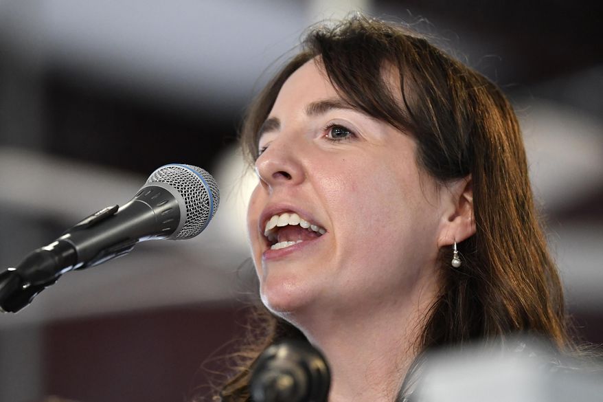 FILE- In this Aug. 3, 2019 file photo, Kentucky republican candidate for State Treasurer, incumbent Allison Ball, addresses the audience gathered at the Fancy Farm Picnic in Fancy Farm, Ky. (AP Photo/Timothy D. Easley, File)