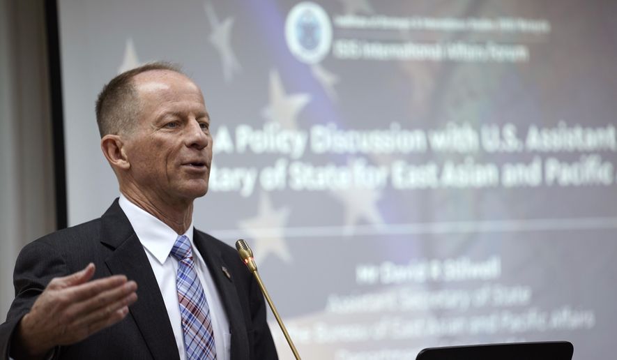 David Stilwell, the U.S. State Department’s assistant secretary for East Asia and the Pacific, left, speaks during a forum in Kuala Lumpur, Thursday, Oct. 31, 2019.  The senior U.S. official says a free and open Indo-Pacific concept is not a move to expand U.S. domination but reflects Washington’s “enduring engagement” to prosper the region. (AP Photo/Vincent Thian)
