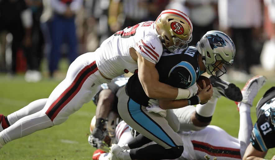 Carolina Panthers quarterback Kyle Allen is sacked by San Francisco 49ers defensive end Nick Bosa during the first half of an NFL football game in Santa Clara, Calif., Sunday, Oct. 27, 2019. (AP Photo/Ben Margot)