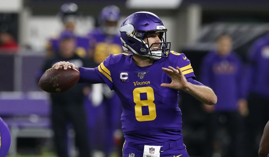 Minnesota Vikings quarterback Kirk Cousins throws a pass during the first half of an NFL football game against the Washington Redskins, Thursday, Oct. 24, 2019, in Minneapolis. (AP Photo/Jim Mone)