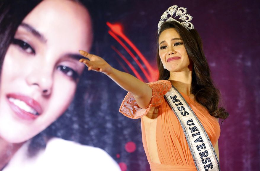 This Feb. 20, 2019 file photo shows Miss Universe 2018 Catriona Gray at a homecoming event in suburban Quezon city, northeast of Manila, Philippines. Tyler Perry’s new Atlanta studio will host the 2019 Miss Universe competition, a major showcase for the sprawling complex built on a former Confederate army base. The three-hour show, hosted by Steve Harvey for the fifth year, will be broadcast live on Fox on Dec. 8. The show will end with reigning champion Gray of the Philippines crowning her successor. (AP Photo/Bullit Marquez, File) **FILE**