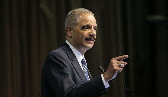 In this April 3, 2019, file photo, former U.S. Attorney General Eric Holder Jr. speaks during the National Action Network Convention in New York. (AP Photo/Seth Wenig, File)