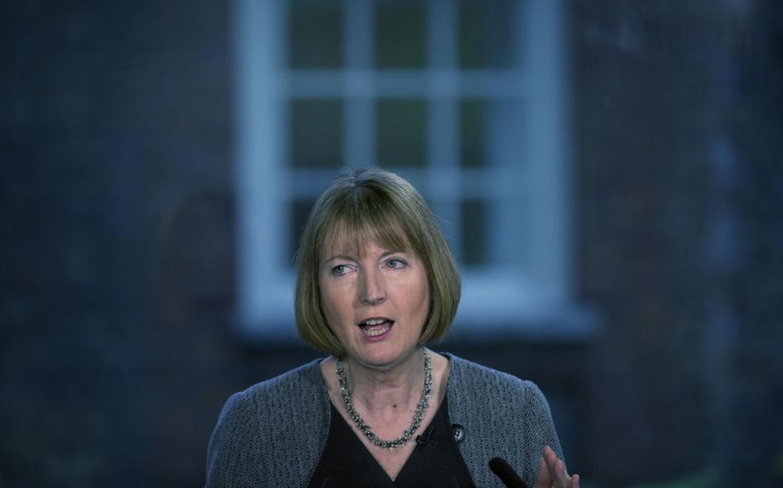 FILE - In this file photo dated Monday, May 18, 2015, British main opposition Labour Party lawmaker Harriet Harman speaks during a press conference at their party headquarters in London. A British Parliamentary Committee on Human Rights said in a report issued Friday Nov. 1, 2019, many people with autism or learning disabilities are being detained in “horrific” conditions and is calling for an overhaul of the system, “This inquiry has shown with stark clarity the urgent change that is needed,” said the committee chair, Harriet Harman, in the statement. (AP Photo/Matt Dunham, FILE)
