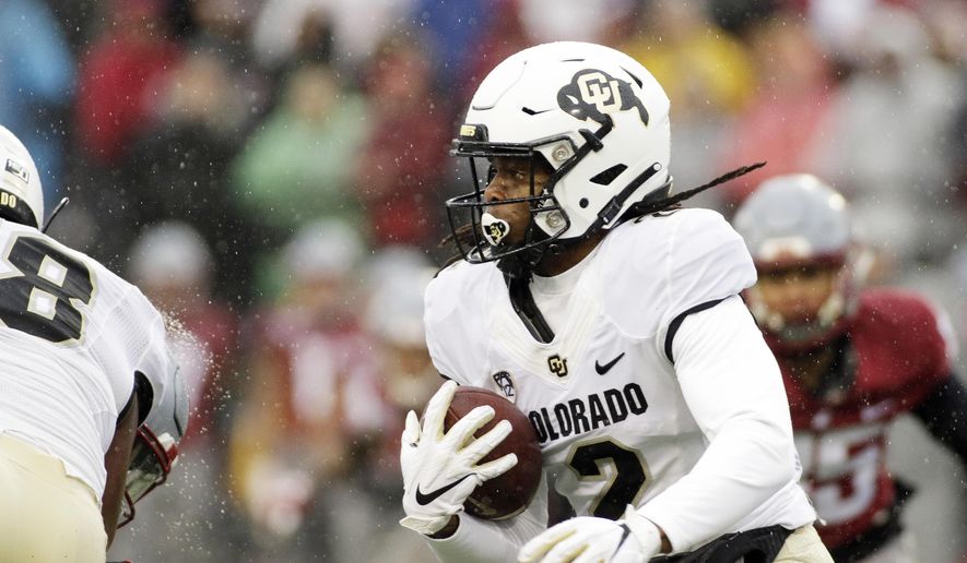 Colorado wide receiver Laviska Shenault Jr. (2) runs with the ball during the first half of an NCAA college football game against Washington State in Pullman, Wash., Saturday, Oct. 19, 2019. (AP Photo/Young Kwak)