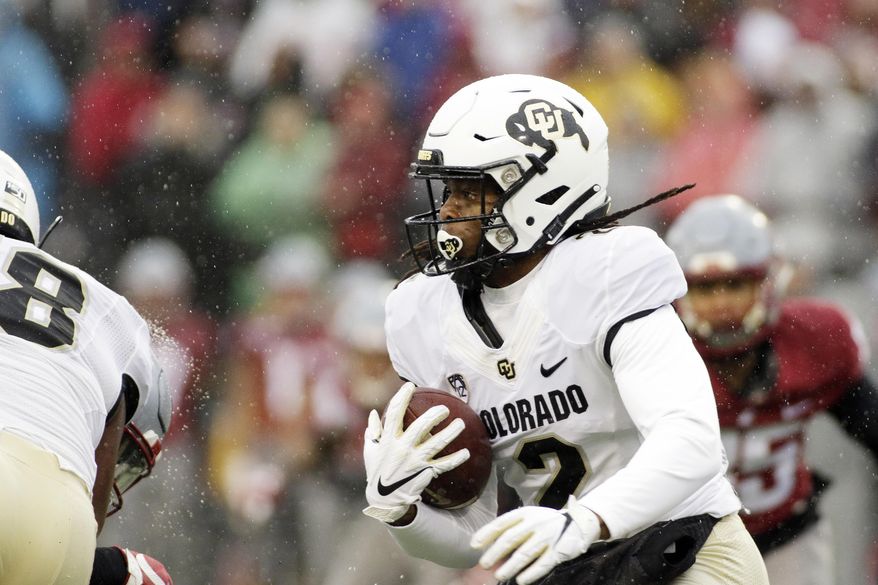 Colorado wide receiver Laviska Shenault Jr. (2) runs with the ball during the first half of an NCAA college football game against Washington State in Pullman, Wash., Saturday, Oct. 19, 2019. (AP Photo/Young Kwak)