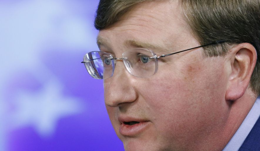 FILE - In this Oct. 14, 2019 file photograph, Republican Lt. Gov. Tate Reeves responds to a question during the second televised gubernatorial debate with Democratic Attorney General Jim Hood in Columbus, Miss. Reeves has spent more than twice as much as the Democrat as noted in their latest campaign finance report on Tuesday, Oct. 29, 2019, a week before the Nov. 5 election. (AP Photo/Rogelio V. Solis, File)