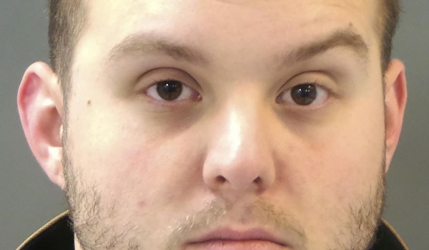 This undated photo provided by the St. Louis Police Department shows St. Louis police officer Matthew EerNisse, who has been charged with first-degree assault for allegedly shooting a car thief suspect in the back. The shooting happened in 2018. The suspect survived. Charges follow an internal police investigation. (St. Louis Police Department via AP)