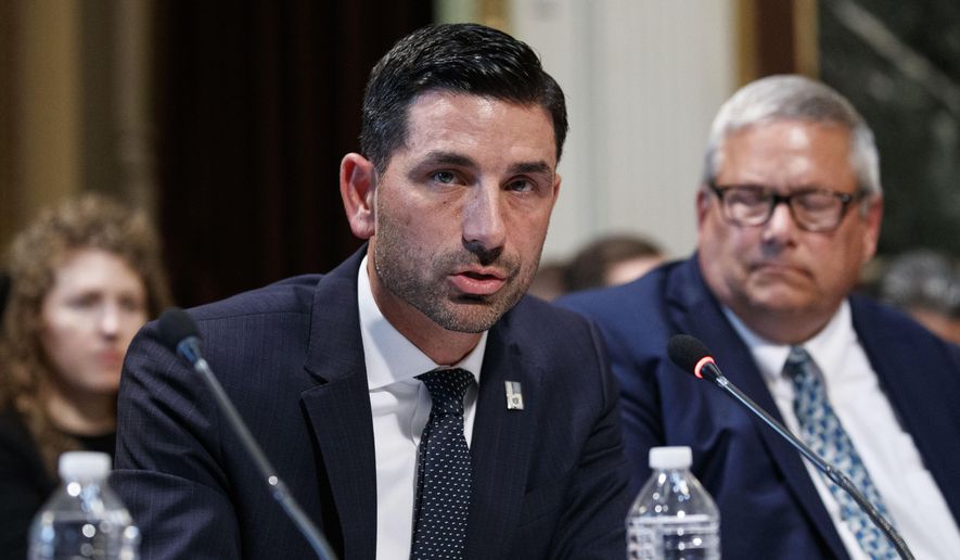 Department of Homeland Security Under Secretary Chad Wolf speaks during a meeting of the President's Interagency Task Force to Monitor and Combat Trafficking in Persons (PITF), in the Eisenhower Executive Office Building, on the White House complex, Tuesday, Oct. 29, 2019, in Washington. (AP Photo/Alex Brandon)