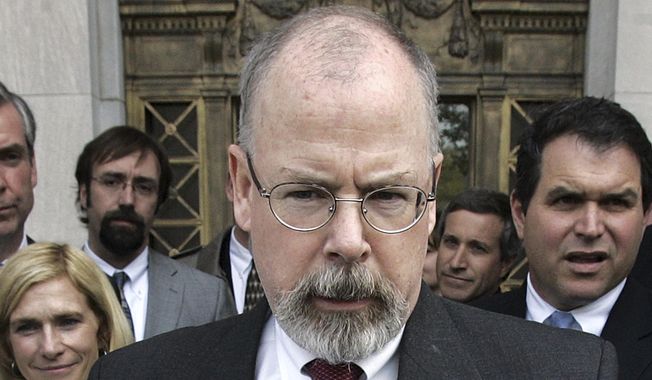 In this April 25, 2006, file photo, John Durham speaks to reporters on the steps of U.S. District Court in New Haven, Conn. Durham is leading the investigation into the origins of the Russia probe. (AP Photo/Bob Child, File)