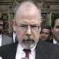 In this April 25, 2006, file photo, John Durham speaks to reporters on the steps of U.S. District Court in New Haven, Conn. Durham is leading the investigation into the origins of the Russia probe. (AP Photo/Bob Child, File)