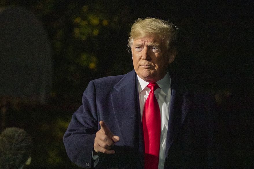 President Donald Trump speaks to reporters as he leaves the White House in Washington for a trip to New York City, Saturday, Nov. 2, 2019. (AP Photo/Manuel Balce Ceneta)