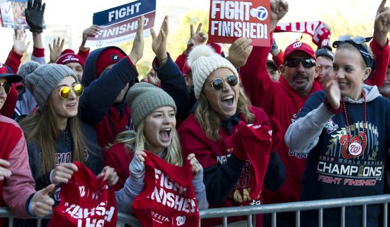 Washington Nationals fans cheers during a rally following the parade to celebrate the team&#x27;s World Series baseball championship over Houston Astros, Saturday, Nov. 2, 2019, in Washington. (AP Photo/Jose Luis Magana) ** FILE **