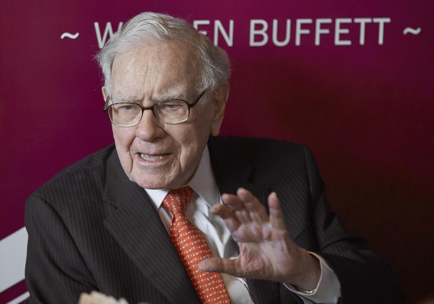 FILE - In this May 5, 2019, file photo Warren Buffett, Chairman and CEO of Berkshire Hathaway, speaks during a game of bridge following the annual Berkshire Hathaway shareholders meeting in Omaha, Neb. Berkshire Hathaway Inc. reports earnings on Saturday, Nov. 2. (AP Photo/Nati Harnik, File)