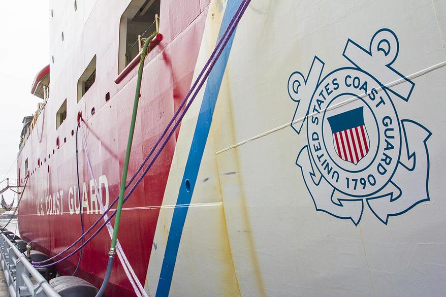 In this photo taken Sunday, Oct. 27, 2019, the USCGC Healy, lies moored to the pier in Juneau, Alaska. The USCGC Healy visited Juneau, mooring downtown on its way home to its homeport in Seattle. The Coast Guard's only medium icebreaker, the Healy has been conducting scientific research in the Arctic with researchers from Woods Hole Oceanographic Institute and the University of Washington. (Michael S. Lockett/Juneau Empire via AP)