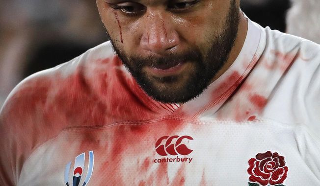 England&#x27;s Billy Vunipola reacts at the end of the match after South Africa defeated England to win the Rugby World Cup final at International Yokohama Stadium in Yokohama, Japan, Saturday, Nov. 2, 2019. (AP Photo/Christophe Ena)