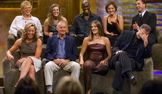 FILE - In this Aug. 23, 2000, file photo, a group of &amp;quot;Survivor&amp;quot; contestants, break into laughter during a live town hall meeting at CBS Studios in Hollywood in Los Angeles. Survivors are, from left, bottom row, Susan Hawk, Rudy Boesch, Kelly Wiglesworth and Richard Hatch, covering his face, top row, Greg Buis, Jenna Lewis, Gervase Peterson, Colleen Haskell and Sean Kenniff. Boesch, a retired tough-as-nails Navy SEAL and fan favorite on the inaugural season of &amp;quot;Survivor,&amp;quot; died Friday, Nov. 1, 2019, after a long battle with Alzheimer&#39;s disease. He was 91. (AP Photo/Kevork Djansezian, File)